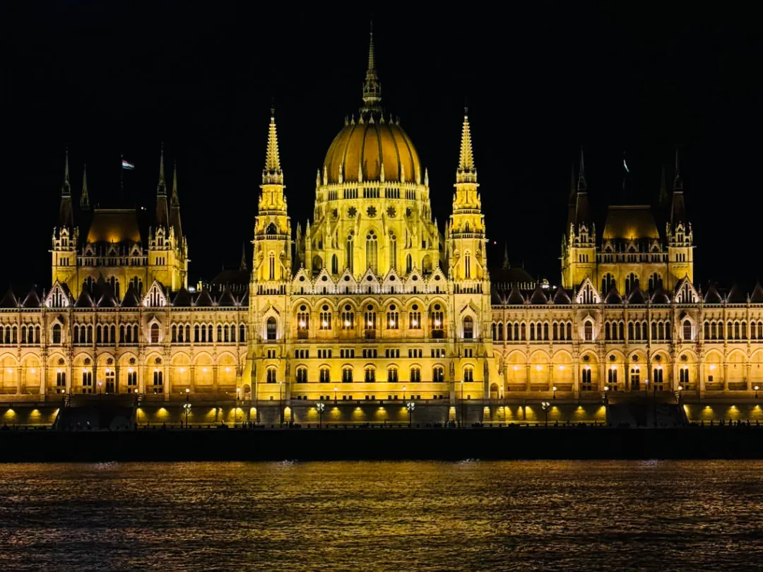 Budapest Parliament beside the Danube at night