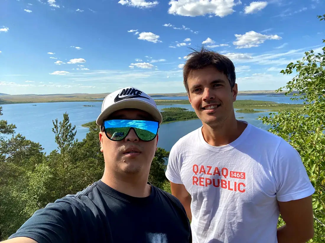 Eduard with a friend above a lake in Kazakhstan